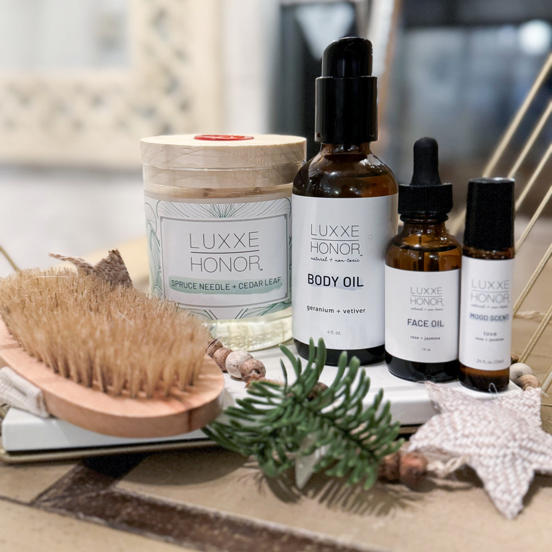 Women&#39;s Holiday Bundle: Face &amp; Body Oil, Brush, Roll-On + Essential Oil Candle